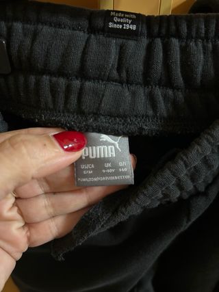 Tuta Puma bambino nera con logo verde