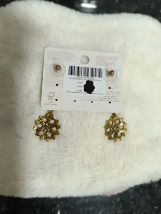 Pendientes Parfois dorados. 6 cm de largo