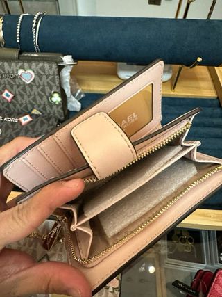 Portafoglio Michael Kors con carte da gioco