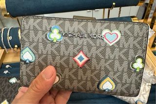 Portafoglio Michael Kors con carte da gioco