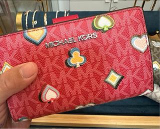 Portafoglio Michael Kors con carte da gioco