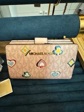 Portafoglio Michael Kors con carte da gioco