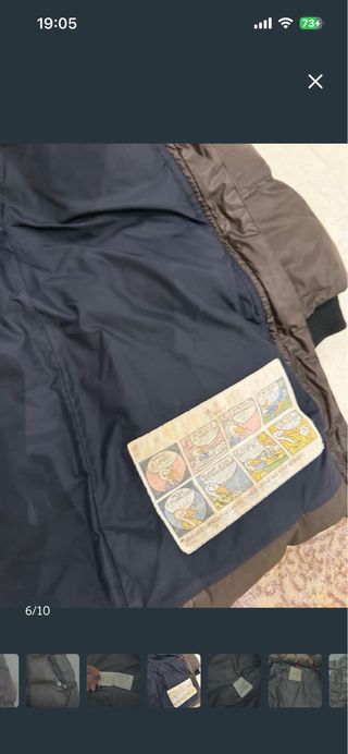 Plumas abrigo tres cuartos marrón.