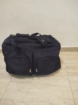 Bolso de viaje azul con ruedas