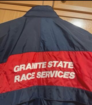 Chubasquero/cortavientos Puma Azul marino y Rojo