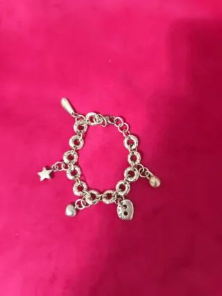Pulsera con charms de estrella y corazón