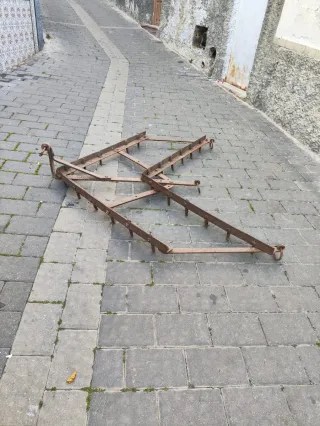 Rastrillo para mulos antiguo