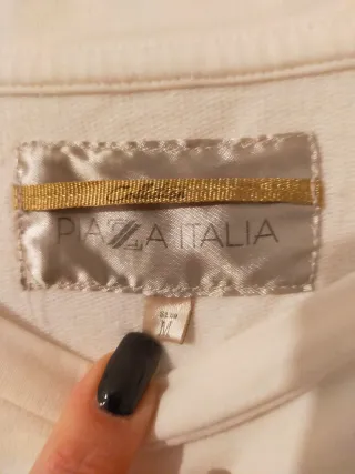 Maglione bianco con decorazioni