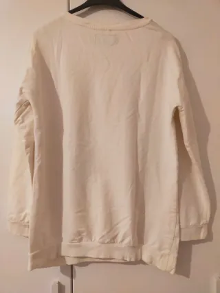 Maglione bianco con decorazioni