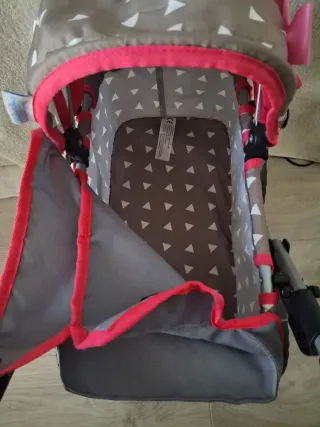 Carrito de muñecas con bolso