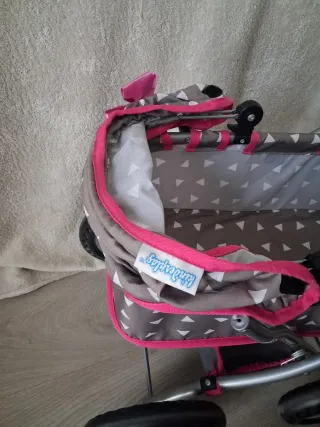 Carrito de muñecas con bolso