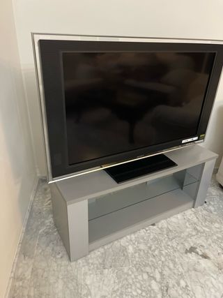 Mesa TV Sony con estantes de cristal