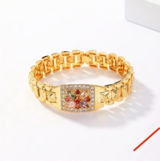 Pulsera dorada con piedras