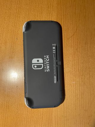 Nintendo switch lite + Animal crossing+Zelda BOTW