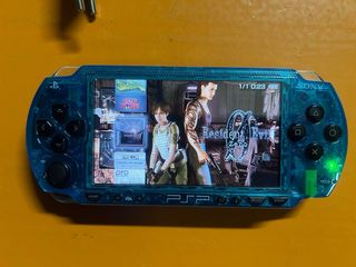 PSP Fat transparente azul y Negro con 2 GB