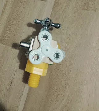 Juguete educativo grifo y tornillo