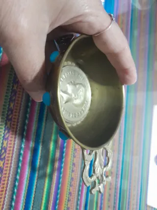 Cenicero con moneda antigua