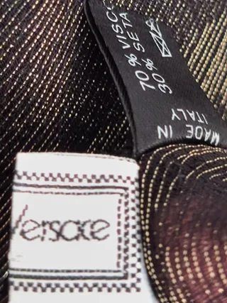 Sciarpa Versace elegante con frange