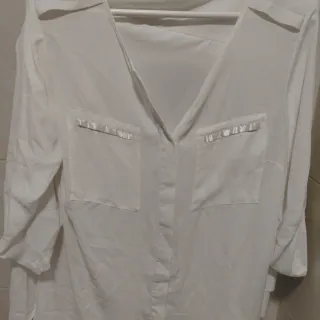 Camisa blanca vaporoso marca Couchel talla M