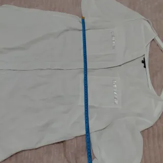 Camisa blanca vaporoso marca Couchel talla M