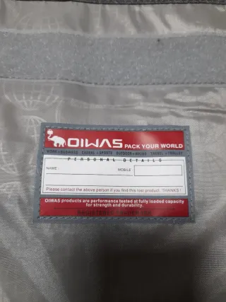 Mochila cartera Pack Your World Gris