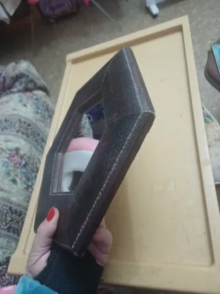 Espejo hexagonal de cuero