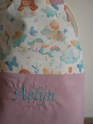 Bata para maestra y bolsita de muda