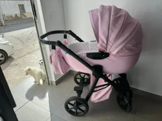 Carro de bebé rosa