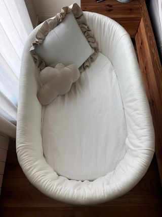 Cuna de bebé de mimbre