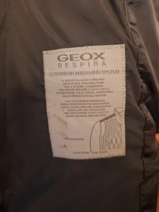 Piumino donna grigio con cappuccio