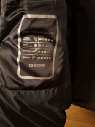 Piumino donna grigio con cappuccio