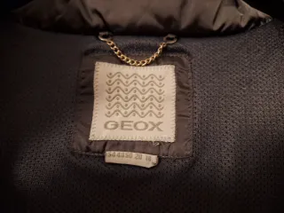 Piumino donna grigio con cappuccio