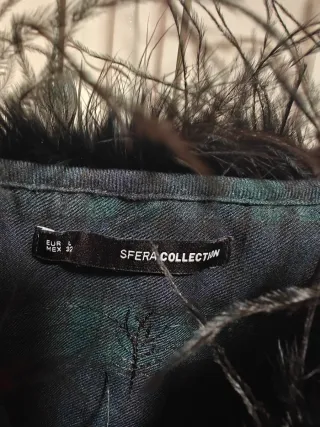 Top fiesta con plumas