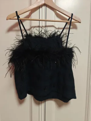 Top fiesta con plumas