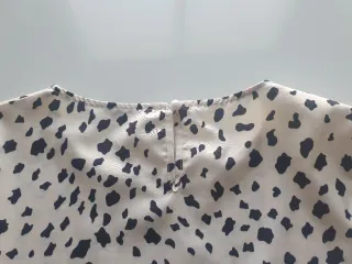 Camisa estampada leopardo beige y negra