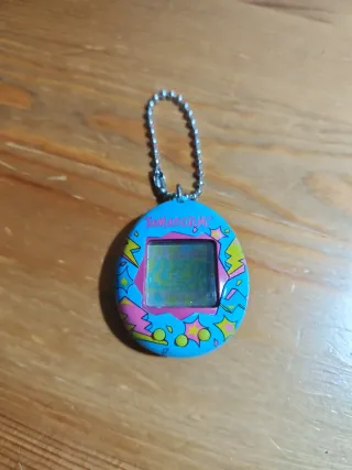 Tamagotchi Azul con Diseño Divertido