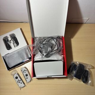 Nintendo Switch OLED Blanca y Negra + funda