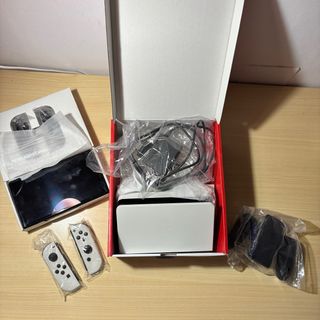 Nintendo Switch OLED Blanca y Negra + funda