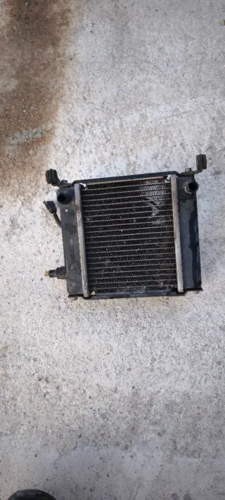 Radiador y ventilador Kymco K-XCT 125