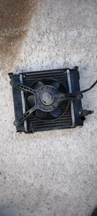 Radiador y ventilador Kymco K-XCT 125