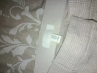 Pantalones de cuadros beige y grises