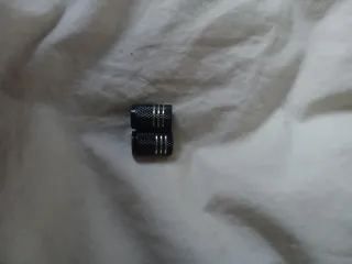 Tapones de válvula negros