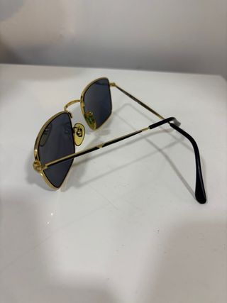 Occhiali vintage neri e oro Police