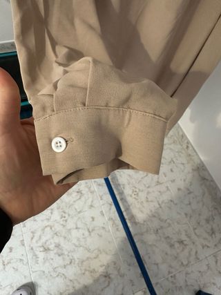 Blusa beige cuello alto T42