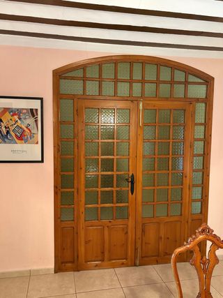 Puerta doble madera y cristal