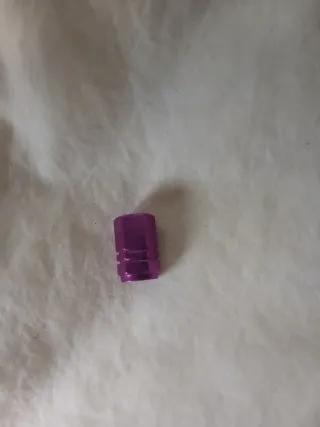 Tapones de válvula rosa fuerte