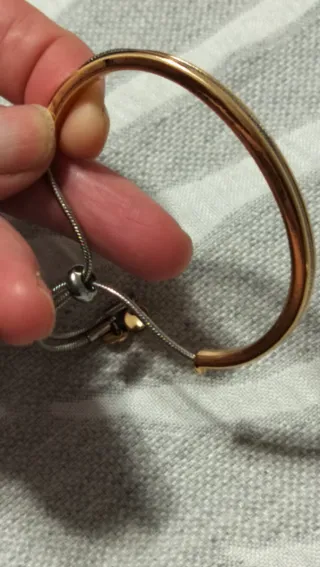 Pulsera rígida ajustable dorada y plateada