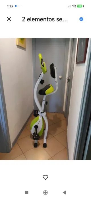 Bicicleta estática plegable verde y blanca