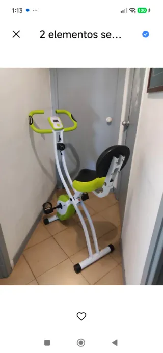 Bicicleta estática plegable verde y blanca