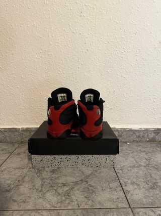 Zapatillas Jordan Retro 13  Negras y Rojas